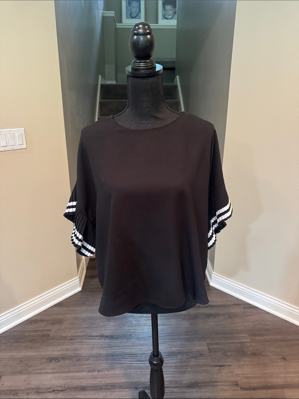 Black Short-Sleeve Blouse with Pleated Ruffle Sleeve and White Stripe